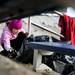 Erin Flaherty, 8, collects garbage. Erin has two siblings who attend Father Gabriel Richard. Daniel Brenner I AnnArbor.com